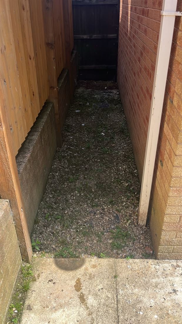 A side alley cleared and swept after a collection